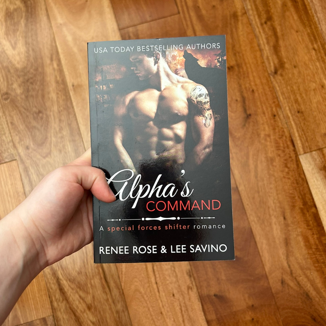 Photo of someone holding a classic Alphas Command cover paperback