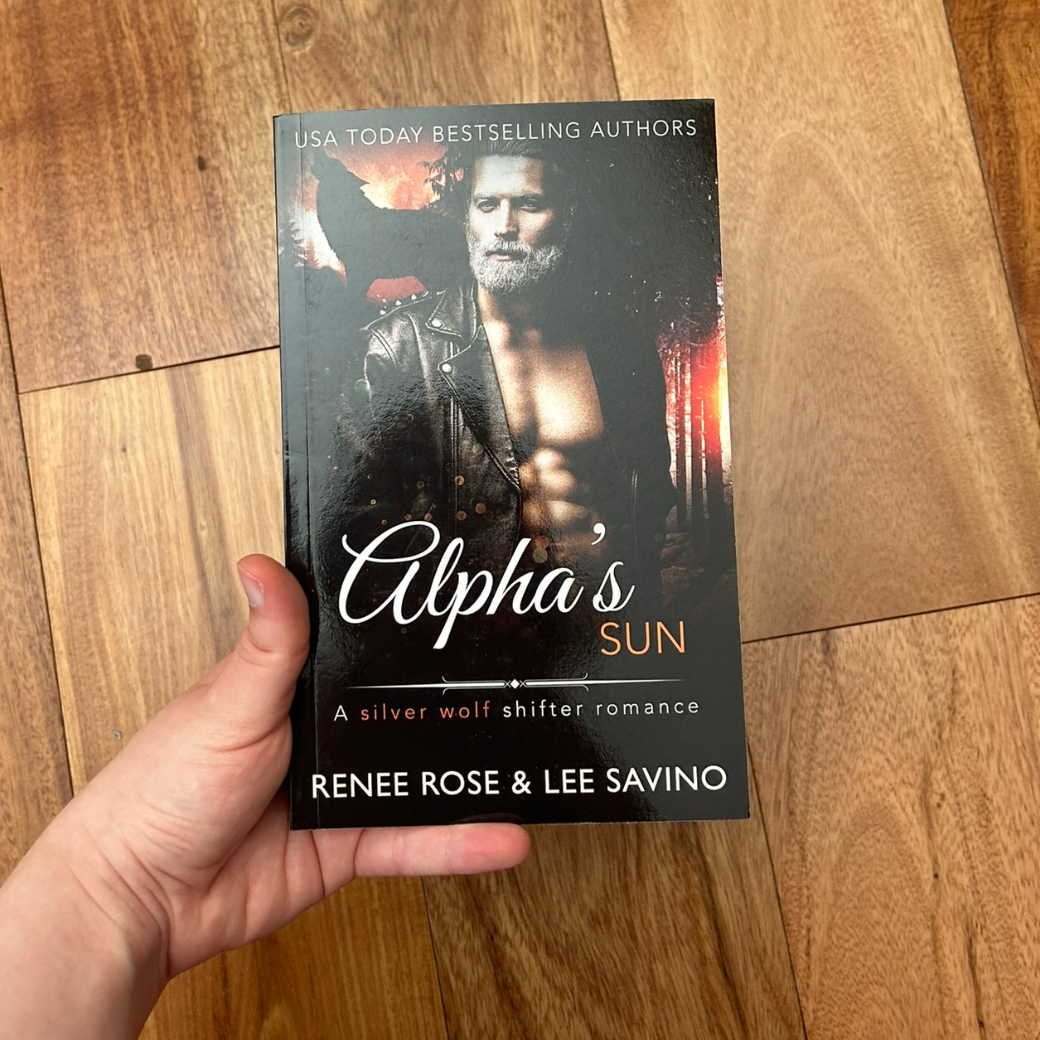 Photo of someone holding a classic Alphas Sun cover paperback