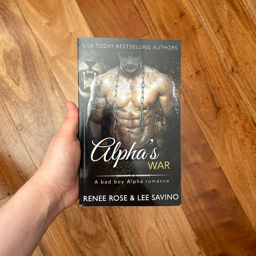 Photo of someone holding a classic Alphas War cover paperback