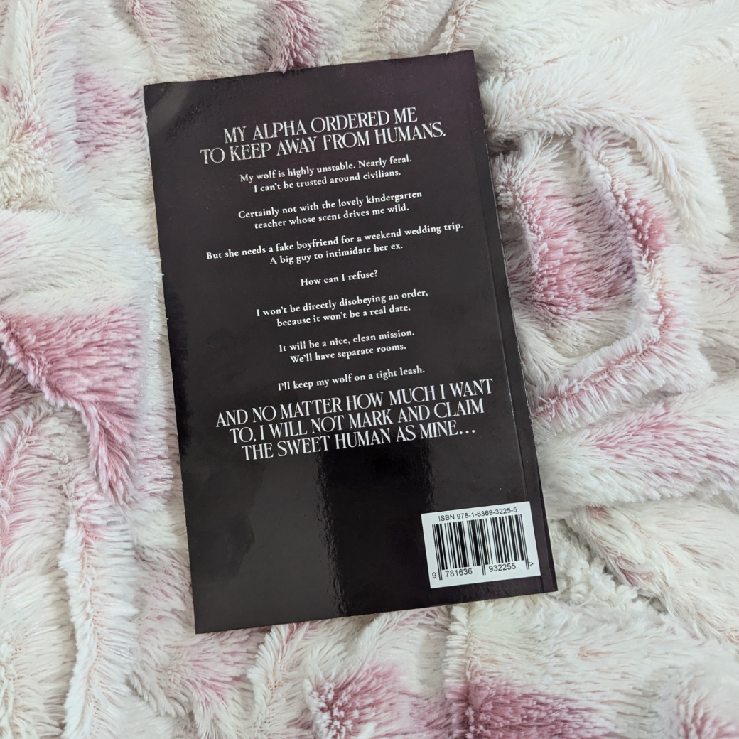 Image of alternative cover paperback back. In white text is the book blurb. 