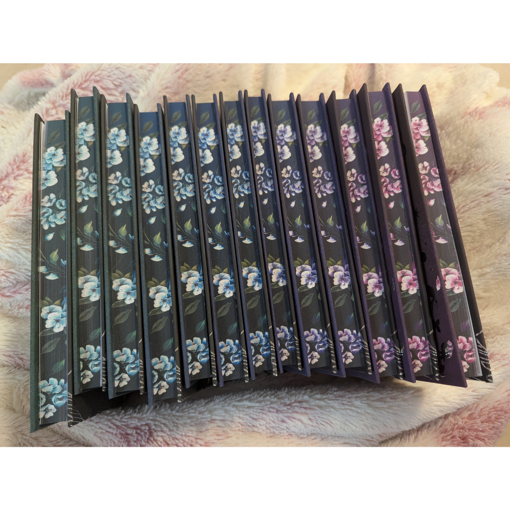 the sprayed edge side with flowers of all 13 books in set