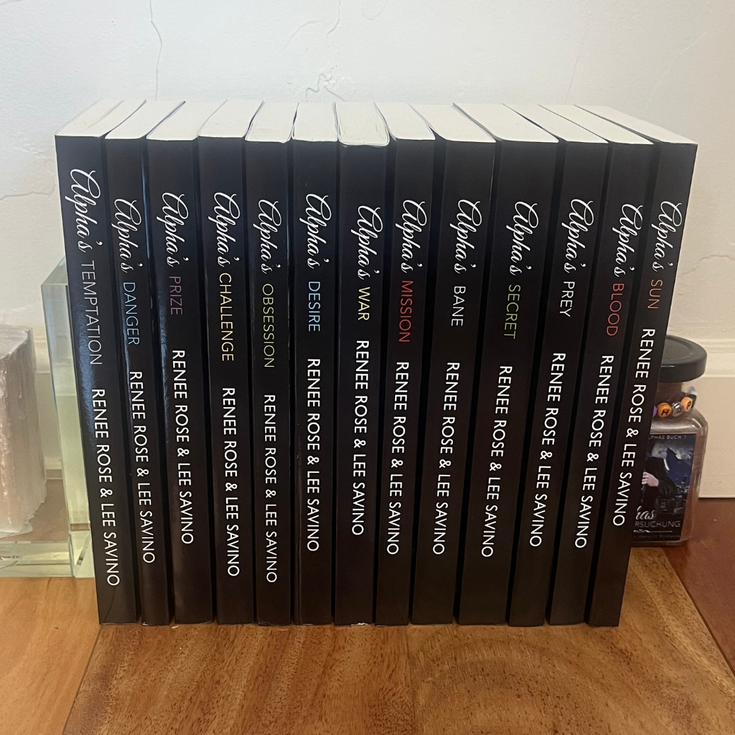 Photo of all the classic cover paperbacks from the Bad Boy Alpha series all lined up