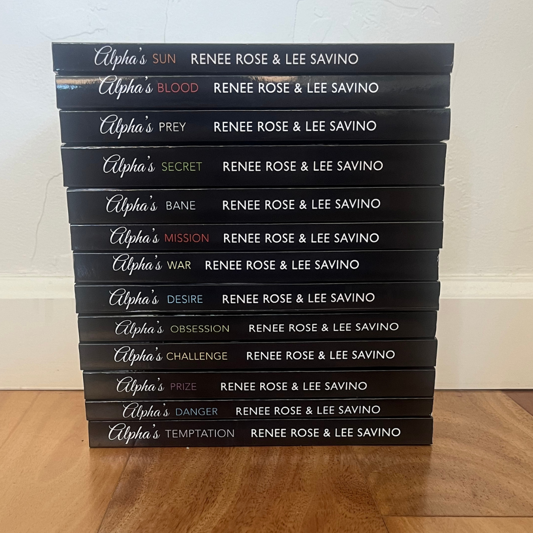 Photo of all the classic cover paperbacks from the Bad Boy Alpha series stacked up