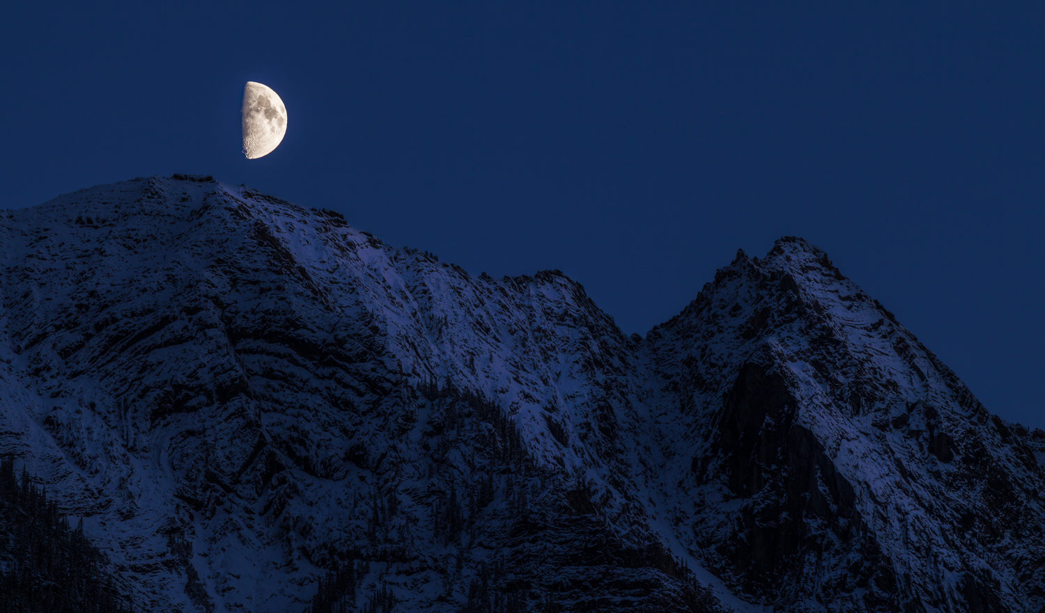 Half Moon Shining over a Mountain