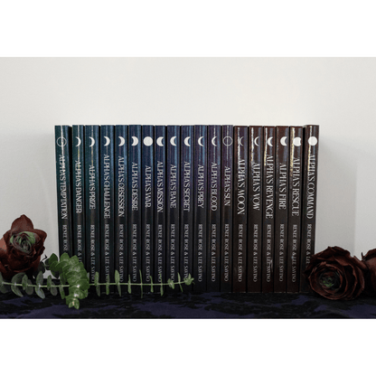 Spines of all 19 books in the set with moon phases 